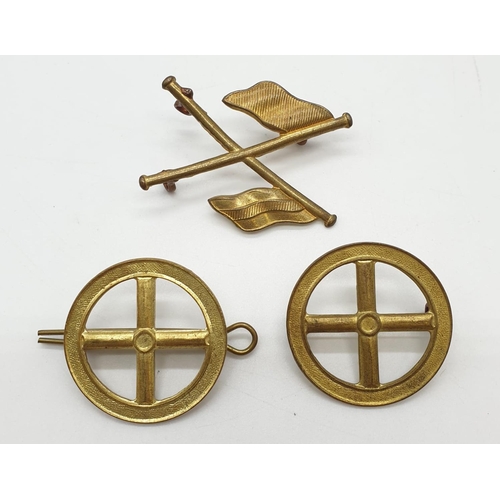 412 - Selection of military brass to include buttons, shoulder pips, crossed flag, signal lens badge, etc.