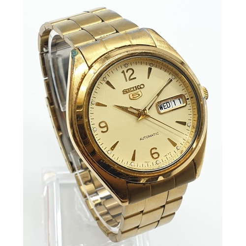 422 - Vintage 1970's SEIKO 5 automatic day date wristwatch. Rose gold face model with gold plated strap. F... 