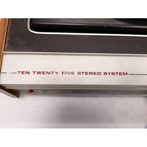 423 - A vintage Garrod record player, model-ten-twenty five stereo system with two stand alone speakers. I... 