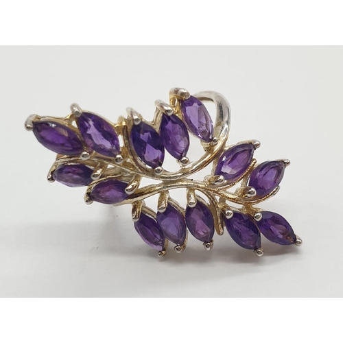 433 - Silver and amethyst ring having 14 stones in the form of leaves. 925 silver. Size L.