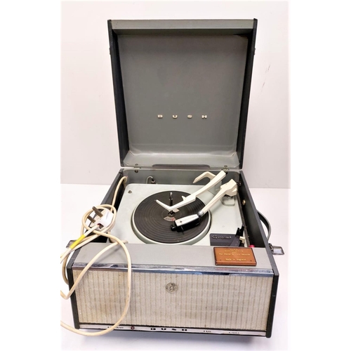 438 - A vintage 1960's Bush SRP31 portable record player featuring a Garrod record deck. In working order.... 