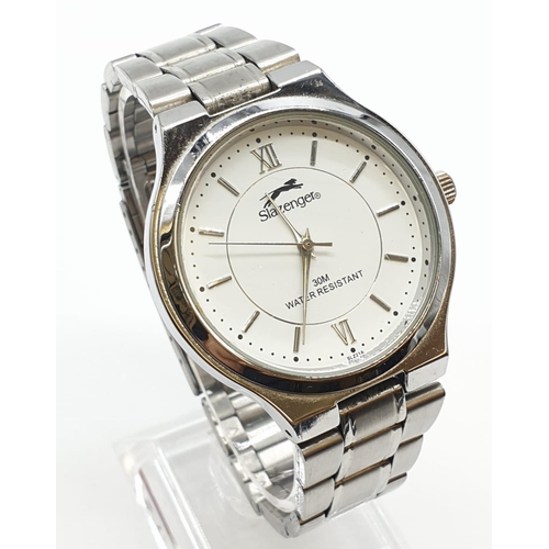 440 - Slazenger gents wristwatch. White face model, stainless steel, Quartz movement. Full working order a... 