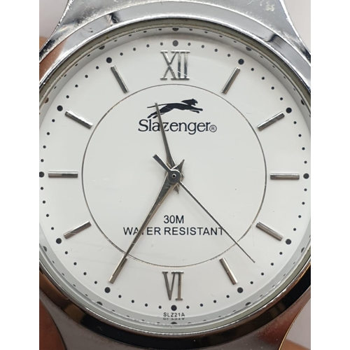 440 - Slazenger gents wristwatch. White face model, stainless steel, Quartz movement. Full working order a... 