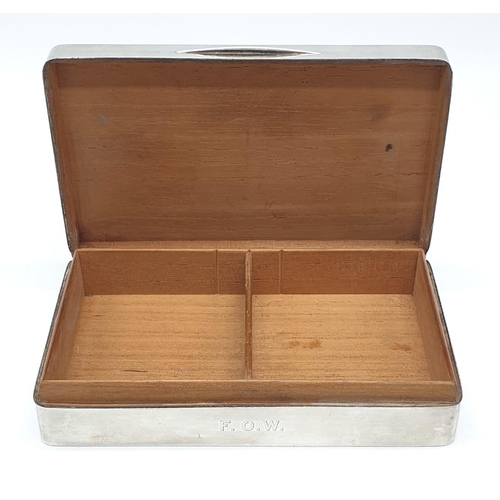 60 - Silver cigarette box with wood interior. Hall marked London 1915. 338 grams. 15x9cms.