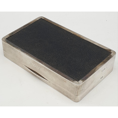 60 - Silver cigarette box with wood interior. Hall marked London 1915. 338 grams. 15x9cms.