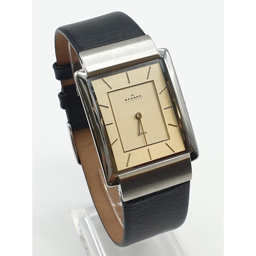 639 - A 'Skagen' men's wrist watch. Ultra slim, stainless steel case with black leather strap.