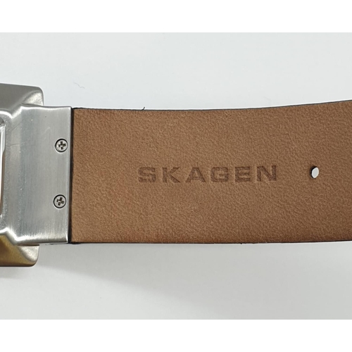 639 - A 'Skagen' men's wrist watch. Ultra slim, stainless steel case with black leather strap.