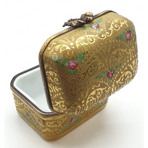 646 - Gold & Rose patterned Limoges trinket box with six miniature perfume bottles.