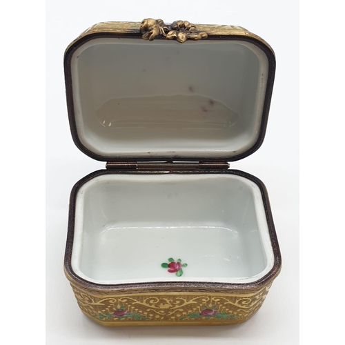 646 - Gold & Rose patterned Limoges trinket box with six miniature perfume bottles.