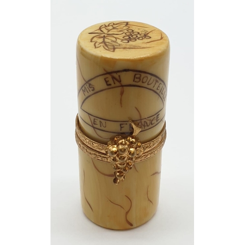 659 - Limoges decorated wine cork container with golden-grape clasp.