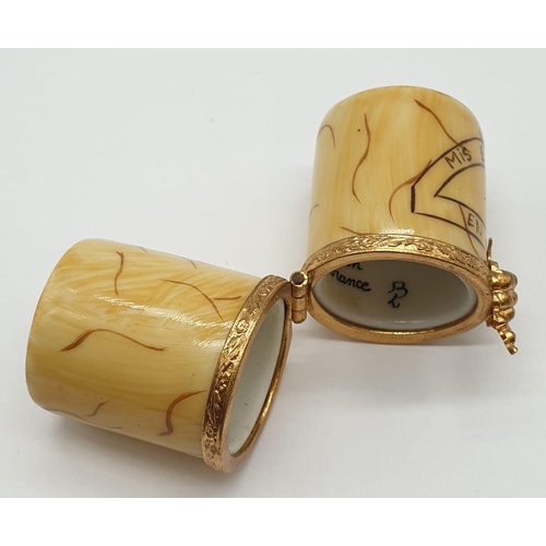 659 - Limoges decorated wine cork container with golden-grape clasp.