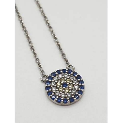 673 - A metallic evil-eye pendant necklace. 21cm long.