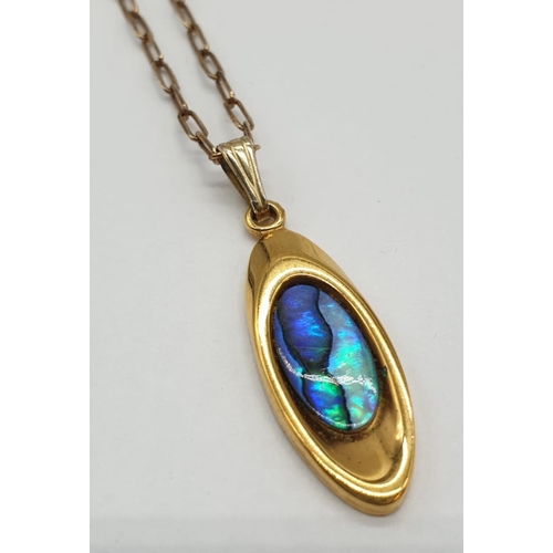 681 - A 925 silver, gold plate necklace with multi-coloured gemstone pendant. 26cm in length.