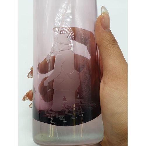 707 - Cranberry glass fishing scene vase, 23cm tall and 6cm diameter