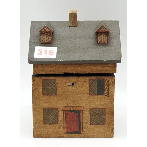 273 - Tea caddy in the form of a wooden house. Needs some renovation. 145cm x 20cm.