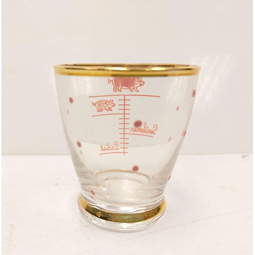 125 - Vintage novelty spirit measurement glass, featuring a ladies measure and a gentlemen measure. Good c... 