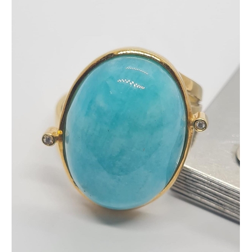 18 - 18ct yellow gold ring with large Amazonite (Peruvian) stone centre (2x2.5cm) and diamonds on sides, ... 