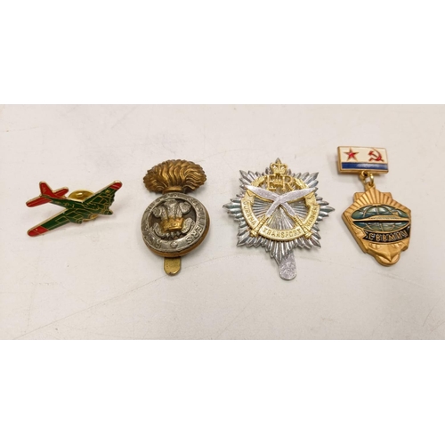 208 - 27 multi-national military badges, including the Highland regiment @Cuidich n Rich' and the Royal Ca... 