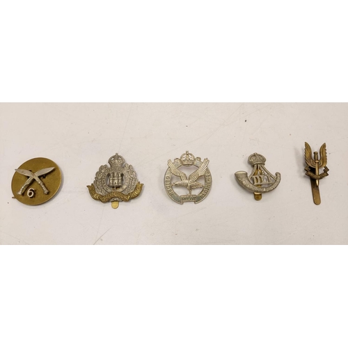 222 - 27 multi-national military badges, including the 'Special Air Service' badge & the 6th Gurkha Rifles... 