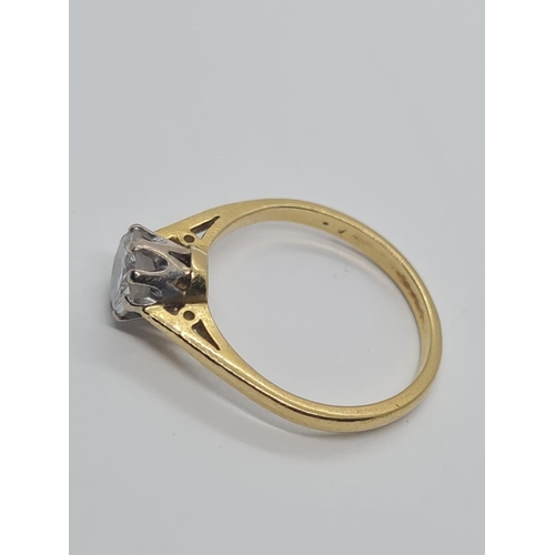 27 - 18ct yellow gold ring with 0.80ct diamond solitaire weight 2.94g and size N1/2.