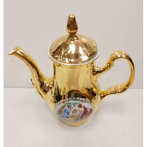 271 - Part of a 'Bernadotte' gold tea set and silver Bavaria teapot.