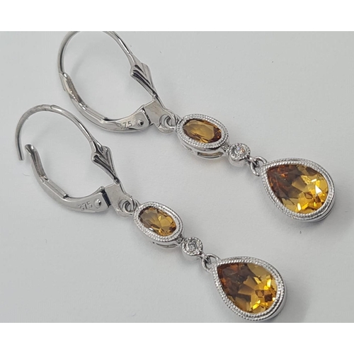 283 - 14ct white gold Diamond & Citrine drop earrings, weight 2.5g and 4cm drop