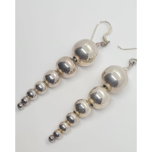 314 - Sterling Silver Graduated Ball Drop Earrings, weight 12g and 4.5cm drop approx