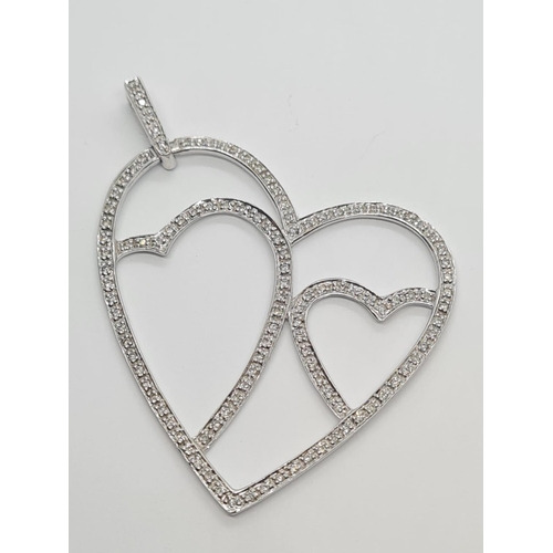 384 - 18CT WHITE GOLD DIAMOND SET HEART PENDANT, WEIGHT 5.7G, SIZE 4x4.5cm approx