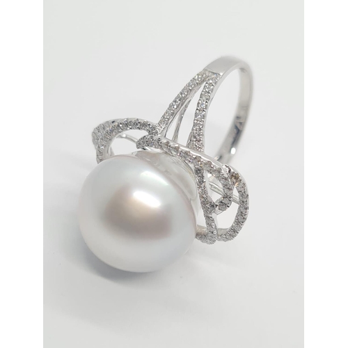 401 - 18ct white diamond ring with large south sea pearl centre (14.82mm) and 1.08ct diamond, weight 9.58g... 