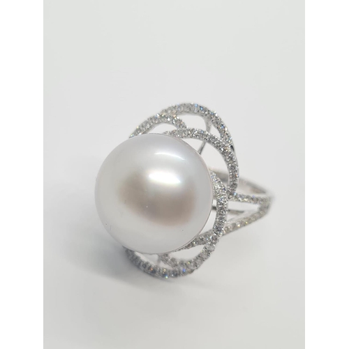 401 - 18ct white diamond ring with large south sea pearl centre (14.82mm) and 1.08ct diamond, weight 9.58g... 