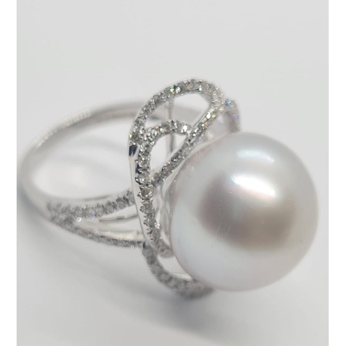 401 - 18ct white diamond ring with large south sea pearl centre (14.82mm) and 1.08ct diamond, weight 9.58g... 