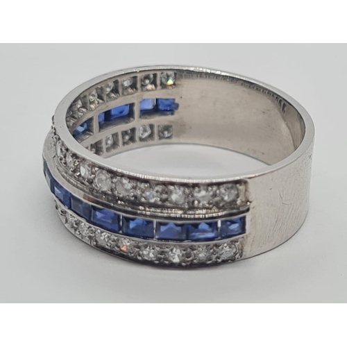 430 - Tested 18ct gold diamond and sapphire half eternity ring, weight 7.1g and size R