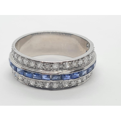 430 - Tested 18ct gold diamond and sapphire half eternity ring, weight 7.1g and size R