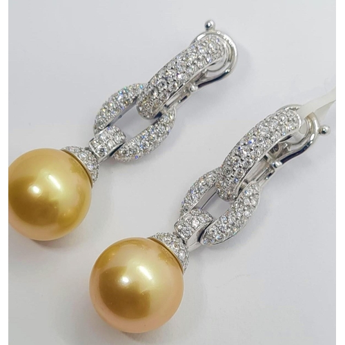 445 - Pair of 18ct white gold diamond earrings with natural golden pearls, weight 15.8g and drop 4cm long ... 