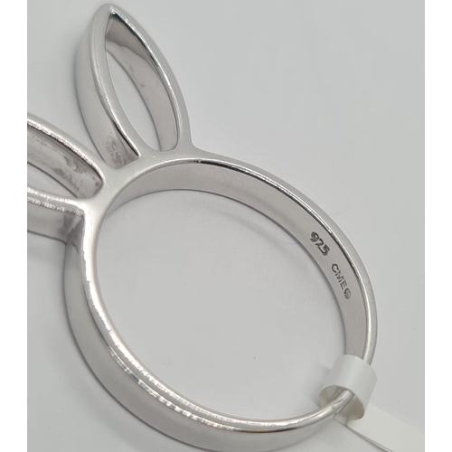 471 - Sterling Silver Playboy bunny ring, weight 3.7g and size M