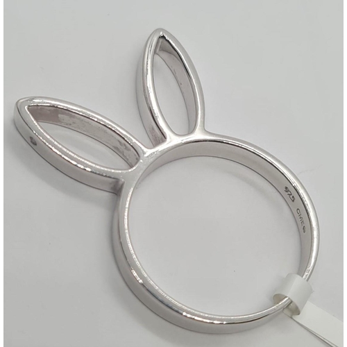 471 - Sterling Silver Playboy bunny ring, weight 3.7g and size M