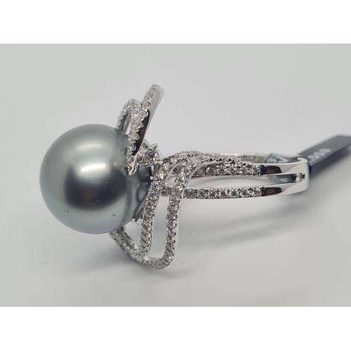 488 - 18ct white gold diamond ring with Tahitian pearl centre, weight 10.07g and size N