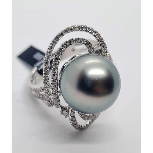 488 - 18ct white gold diamond ring with Tahitian pearl centre, weight 10.07g and size N