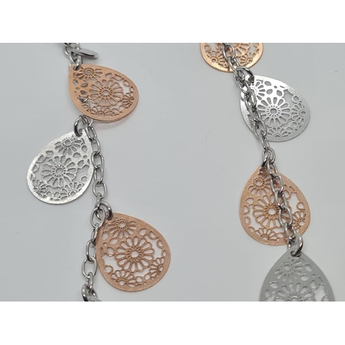 498 - Sterling Silver fancy drop earrings silver and rose gold vermeil, 7cm drop approx