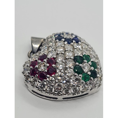 499 - 18CT WHITE GOLD HEART PENDANT WITH DIAMOND, EMERALD, SAPPHIRE AND RUBY ENCRUSTED, WEIGHT 6.5G AND 2X... 