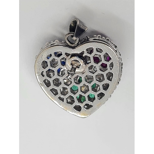 499 - 18CT WHITE GOLD HEART PENDANT WITH DIAMOND, EMERALD, SAPPHIRE AND RUBY ENCRUSTED, WEIGHT 6.5G AND 2X... 