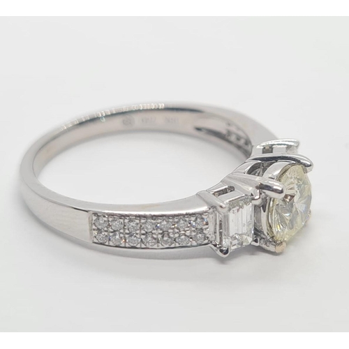 52 - 18ct white gold ring with 0.72ct diamond solitaire centre and further 0.60ct diamond shoulders appro... 