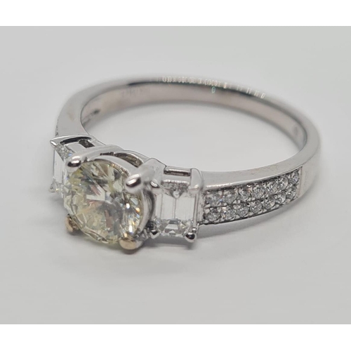 52 - 18ct white gold ring with 0.72ct diamond solitaire centre and further 0.60ct diamond shoulders appro... 