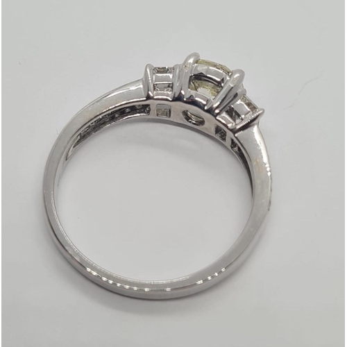 52 - 18ct white gold ring with 0.72ct diamond solitaire centre and further 0.60ct diamond shoulders appro... 