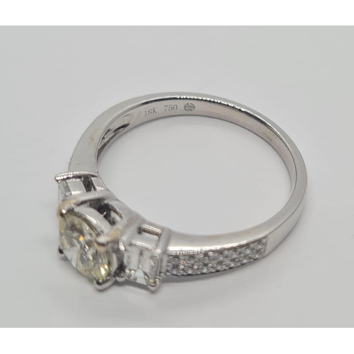 52 - 18ct white gold ring with 0.72ct diamond solitaire centre and further 0.60ct diamond shoulders appro... 