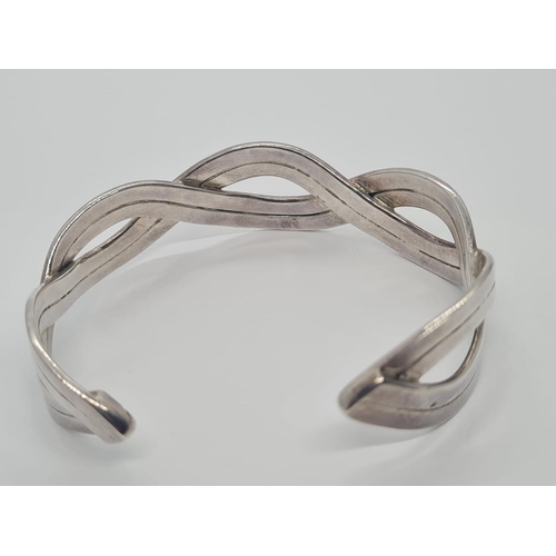 542 - Sterling Silver Twisted Rope Bangle, weight 26g and 6cm wide approx