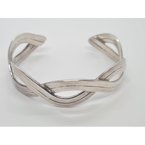 542 - Sterling Silver Twisted Rope Bangle, weight 26g and 6cm wide approx