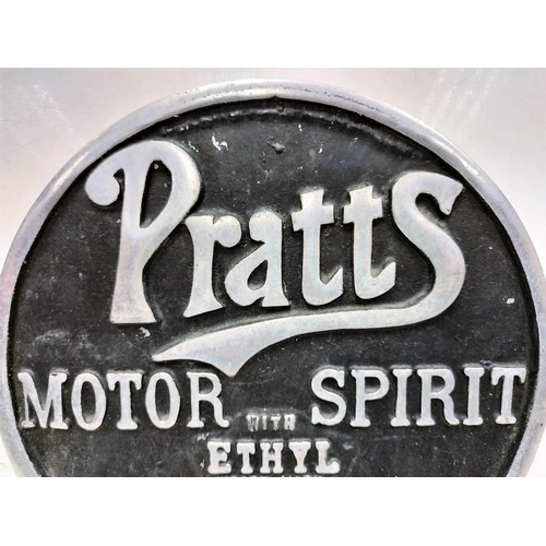 558 - A vintage Pratt's motor spirit sign. Cast iron, circular 26cm diameter.