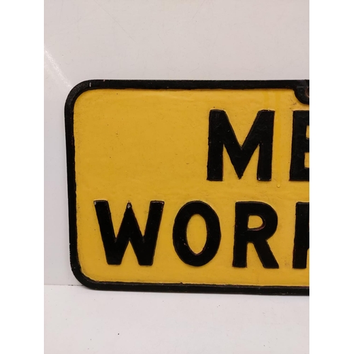 563 - A vintage 'Men Working' metallic sign. Black print on yellow.