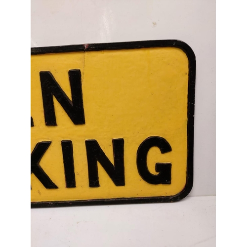 563 - A vintage 'Men Working' metallic sign. Black print on yellow.